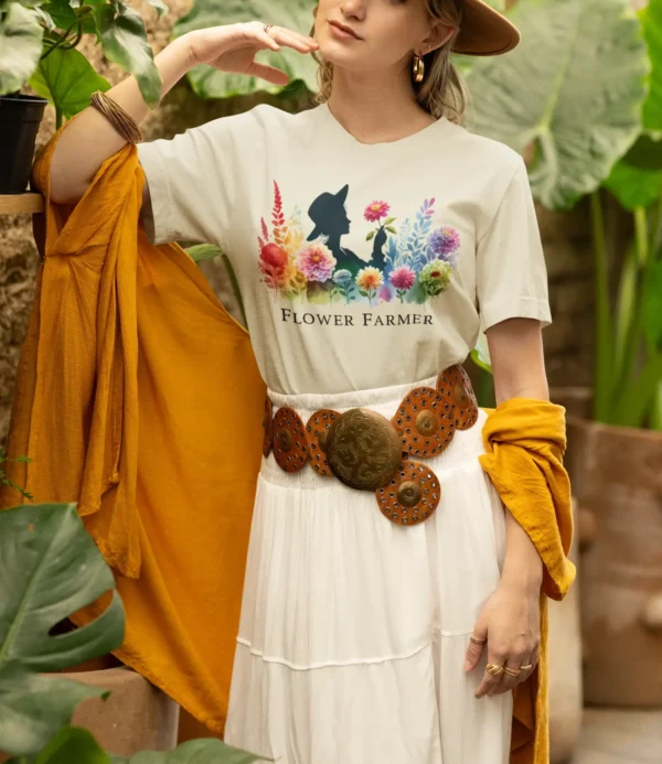 bella canvas t shirt mockup of a woman in a boho inspired outfit posing by some plants m36848 1 scaled e1708468323113